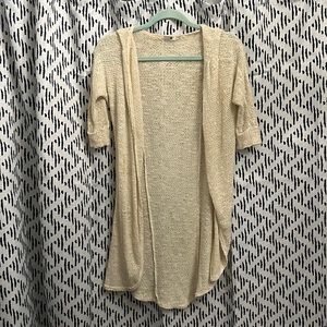 Cream colored light knit duster